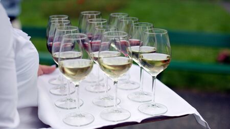 Close up ready to serve wine in wine glasses.の写真素材