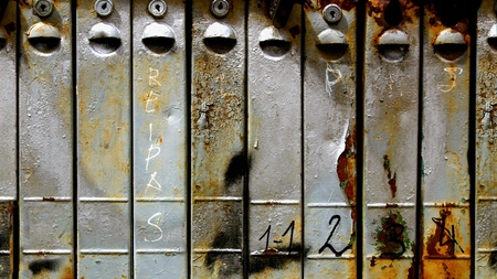 Close up old rusty metallic mail boxesの写真素材