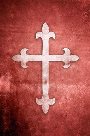 White Holy Cross on red textured grunge backgroundの写真素材