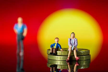 The parent is handcuffed to the child. The concept of parental debt. Alimony payment. Custody, care...