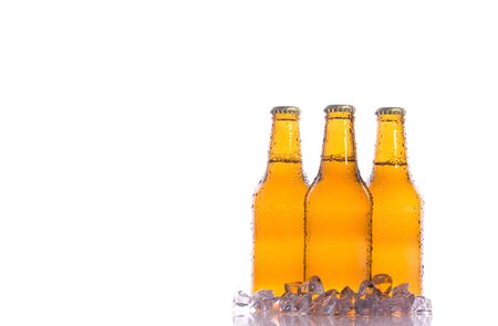 Three isolated fresh beers with iceの写真素材
