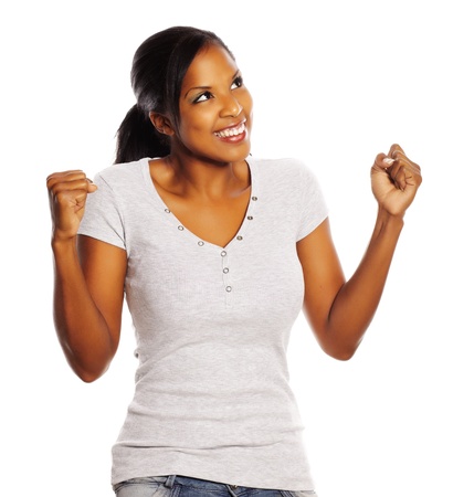 Portrait of a isolated happy young pretty black woman.の写真素材
