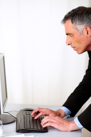 Portrait of a professional person working at the deskの写真素材