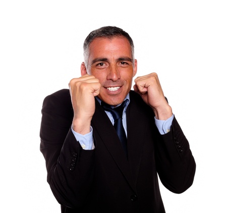 Portrait of a charming latin businessman boxing on isolated backgroundの写真素材