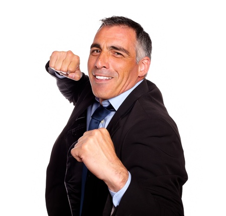 Portrait of a elegant latin broker man on black suit boxing against white backgroundの写真素材