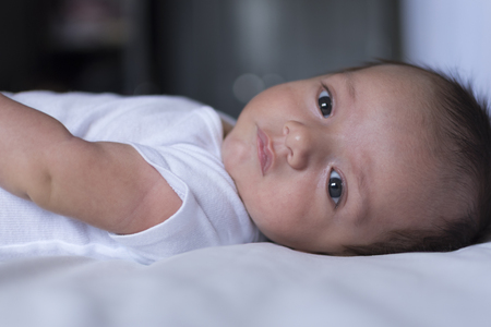 Little baby with gray eyesの写真素材