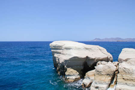cliff and white rocks of the greek island of milosの写真素材