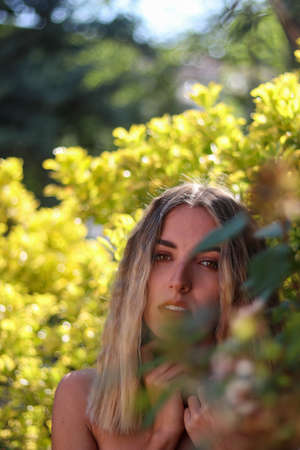 Close up portrait of a beautiful girl looking at the cameraの写真素材