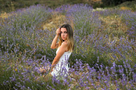 Portrait of young woman in lavander fieldの写真素材