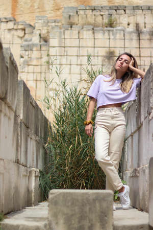 Botom portrait of woman in a sandstone quarry of Litica, Menorcaの写真素材