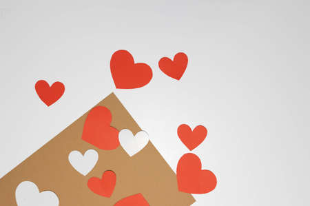 Love letter with red hearts on a white backgroundの写真素材