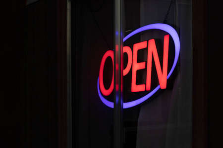 OPEN restaurant neon sign in night time