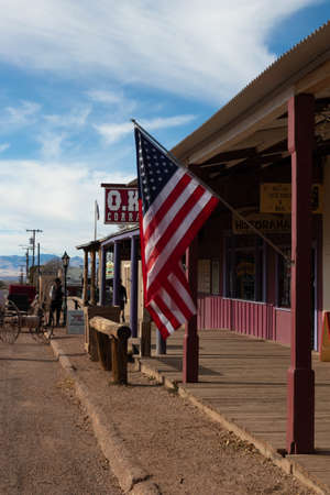 American flag waving at Old Town Tombstone streetsのeditorial素材