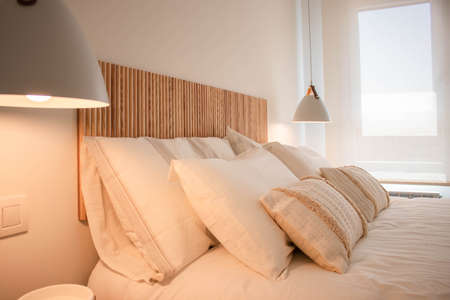 Close up of cozy apartment bedroom with boho styleの写真素材