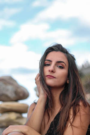 Sexy portrait of brunette woman looking to the camera with brown makeupの写真素材