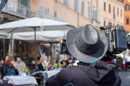 Rome, Italy - March 17th, 2022. News reporter with camera recording live for news in Italyのeditorial素材