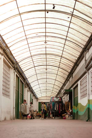 BILBAO, SPAIN-MAY, 5TH, 2022: Vertical view of people in market in a poor neigbourhood in europe. Zorrozaurreのeditorial素材