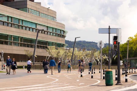 BILBAO, SPAIN-MAY, 5TH, 2022: European city landscape in the Area of the Euskalduna Palace with people walkingのeditorial素材