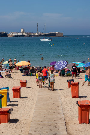 PLaya La Calta, Cadiz, Andalucia, Spain; 23th August 2022: Poeple at the beach in summer seasonのeditorial素材