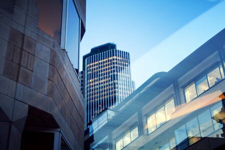 Office building in city of London by nightの写真素材