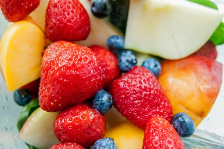 Strawberry blueberry peach apple fruit mix for smoothieの写真素材