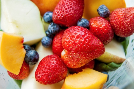 Strawberry blueberry peach apple fruit mix for smoothieの写真素材