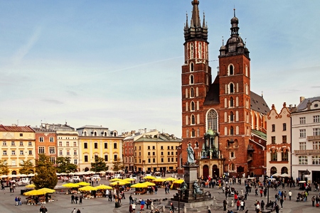 Saint Mary Basilica and Sukiennice town market square in Krakowの写真素材