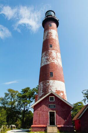 Assateague Light is the 142-foot-tall  lighthouse built in 1867.  The lighthouse is located on the southern end of Assateague Island off the coast of the Virginiaの写真素材