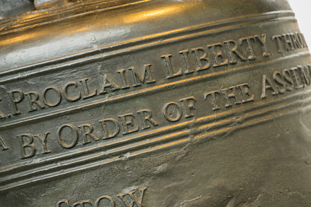 Focus on Proclaim Liberty on the Liberty Bell in Philadelphia, Pennsylvaniaの写真素材