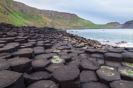 According to legend, the interlocking basalt columns are the remains of a causeway built by legendary giant Finn MacCoolの写真素材
