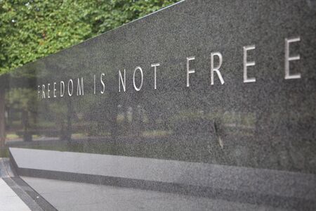 WASHINGTON, DC - AUGUST 2012: Granite monument at the Korean War Memorial which reads: "Freedom Is Not Free". The Korean War Memorial is located in West Potomac Park in Washington, DCのeditorial素材