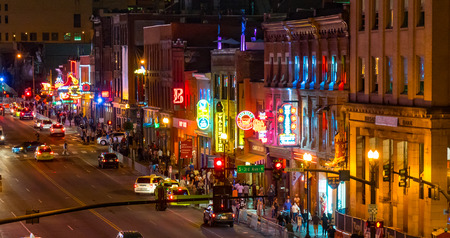 NASHVILLE, TN - OCT 8: Neon signs light the strip along Broadway on October 8, 2017 in Nashville, Tennessee, USAのeditorial素材