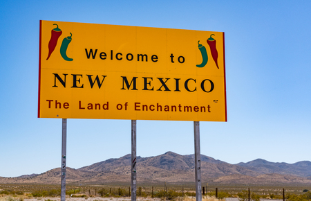 NEW MEXICO, USA - OCTOBER 26, 2017:  Welcome to New Mexico sign along the highway at the state border.のeditorial素材