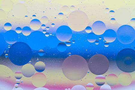 Colorful Bubble Spheres Background in Liquidの写真素材