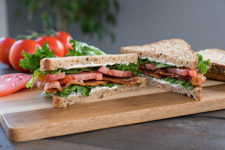 Fresh Bacon, Lettuce and Tomato Sandwich on a Cutting Board
