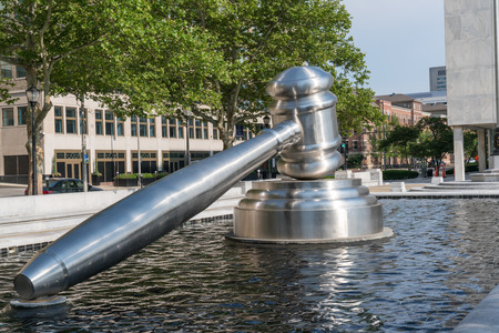COLUMBUS, OH - JUNE 17, 2018: Stainless steel gavel sculpture created by Andrew Scott located in the courtyard of the Ohio Judicial Center in downtown Columbus, Ohioのeditorial素材