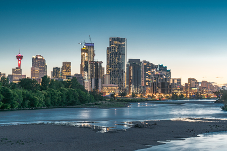 Night skyline of the city Calgary, Alberta, Canada along the Bow Riverの写真素材