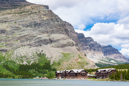 MANY GLACIER, MT - JUNE 30, 2018: Many Glacier Lodge on the shores of Swift Current Lake in Glacier National Park, Montanaのeditorial素材