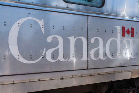 JASPER, CANADA - JULY 5, 2018: Canada on the side of a Rail Canada passenger car in Jasper, Canadaのeditorial素材
