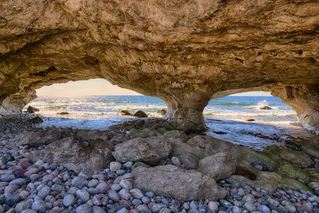 Arches along the coast of the Gulf of St Lawrence in Arches Provincial Park in Newfoundland, Canadaの写真素材
