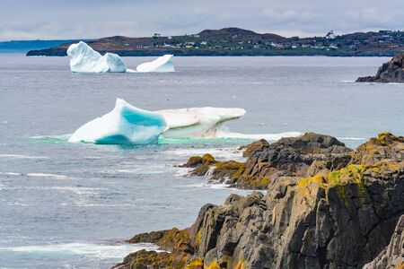 Iceberg floating in the ocean off the coast of Newfoundland, Canada
