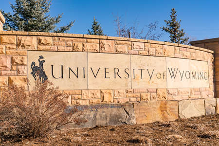 Laramie, WY - December 5, 2020:  Stone University of Wyoming sign outside of the university campus in Laramieのeditorial素材