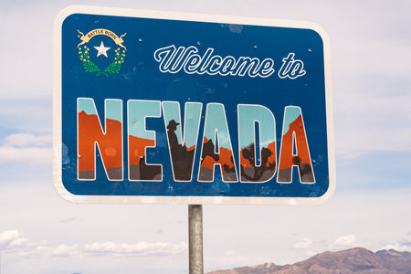 Furnace Creek, CA - March 4, 2022: Welcome to Nevada Sign along the highway at the state borderのeditorial素材