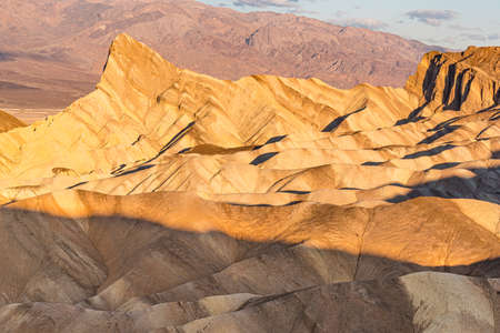 Sunrise at Zabriskie Point in Death Valley National Parkの写真素材
