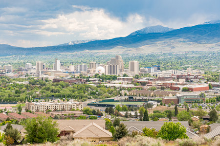 Reno, NV - May 24, 2023: Overlook of the city skyline of Reno, Nevada with the mountains in the backgroundのeditorial素材
