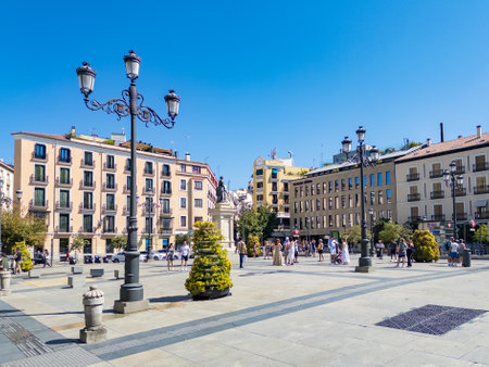 Madrid, Spain - August 28, 2023:  Old historic buildings surrounding the Plaza de Isabel II in downtown Madrid near the Madrid Opera house.のeditorial素材