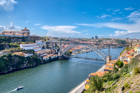 View of the Dom Luis I bridge as it crosses the Douro River in Porto, Portugal