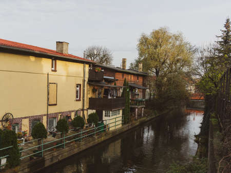 City canal with a building located by the waterの写真素材