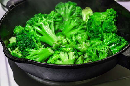 broccoli in a frying pan. Broccoli roasting.の写真素材
