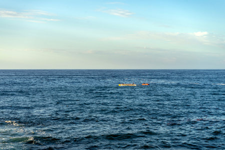 training of rowers on a kayak in the open ocean